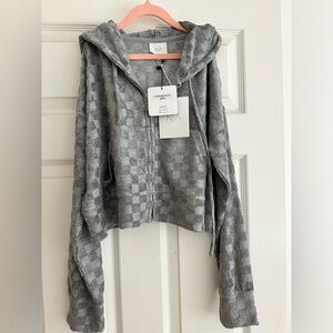 Women’s NIA zip sweater, brand new never worn